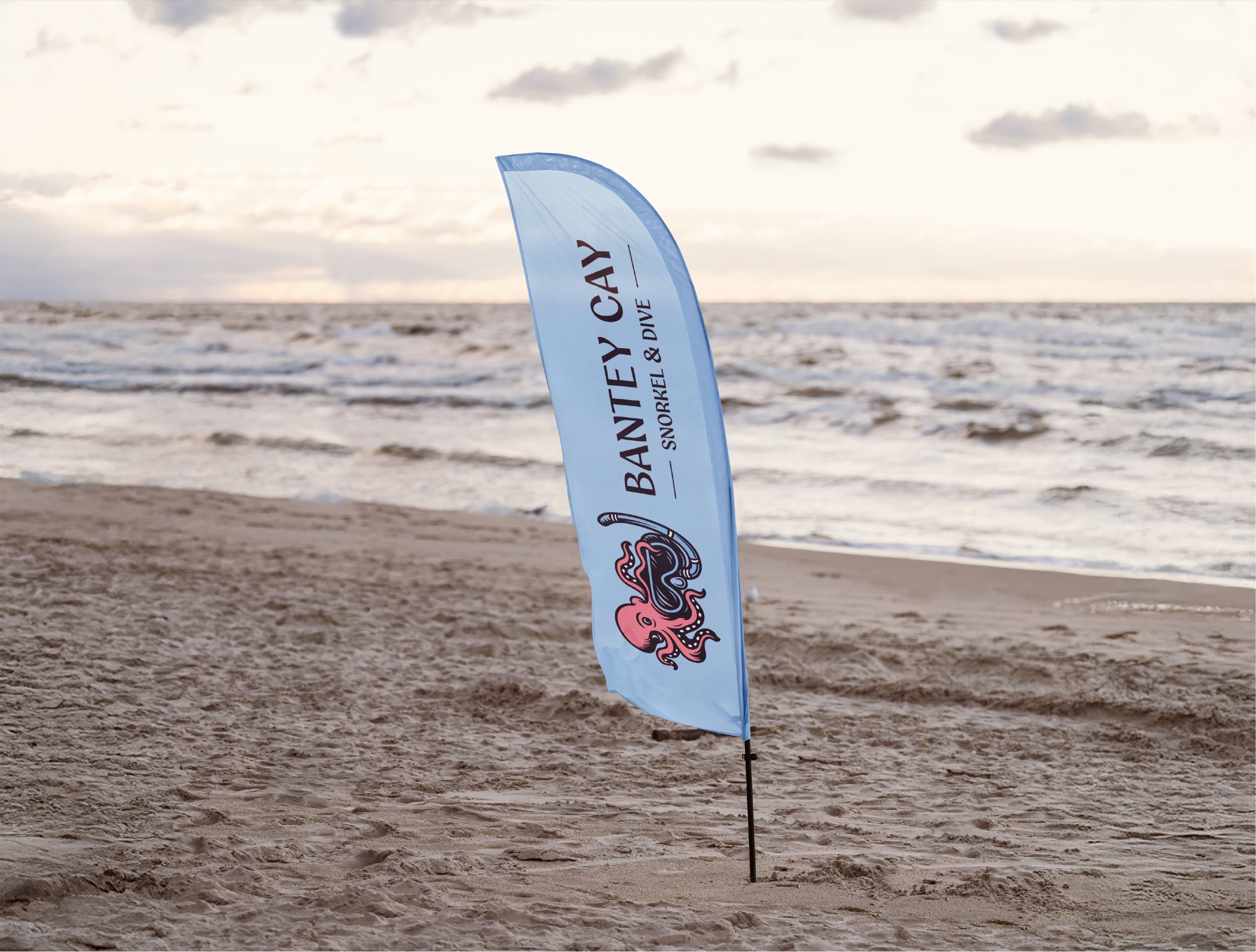 Bantey Cay beach flag displayed beside the ocean